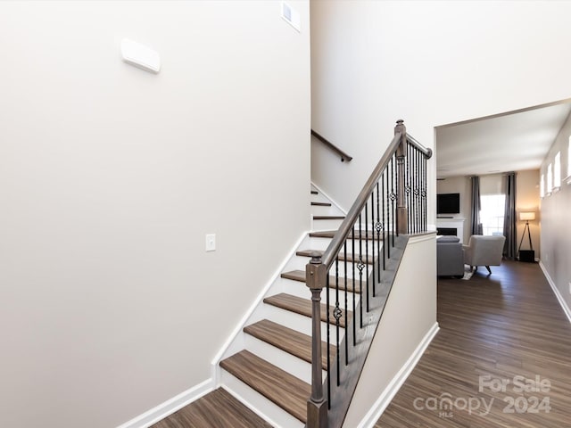 15533 Capps Rd, Charlotte, NC 28278 - stairs featuring wood finished floors and baseboards