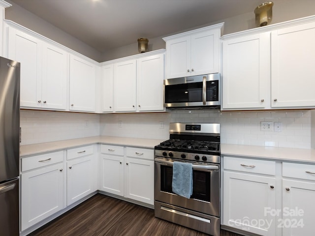 15533 Capps Rd, Charlotte, NC 28278 - kitchen featuring stainless steel appliances, dark wood-style flooring, light countertops, and white cabinets