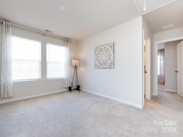 15533 Capps Rd, Charlotte, NC 28278 - carpeted spare room featuring attic access and baseboards