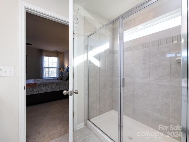15533 Capps Rd, Charlotte, NC 28278 - ensuite bathroom with a stall shower and tile patterned flooring