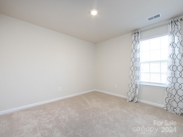 15533 Capps Rd, Charlotte, NC 28278 - carpeted empty room with healthy amount of natural light