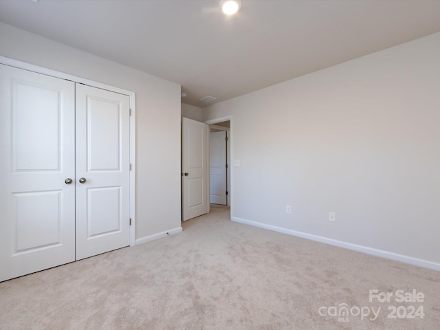 15533 Capps Rd, Charlotte, NC 28278 - unfurnished bedroom featuring carpet and a closet