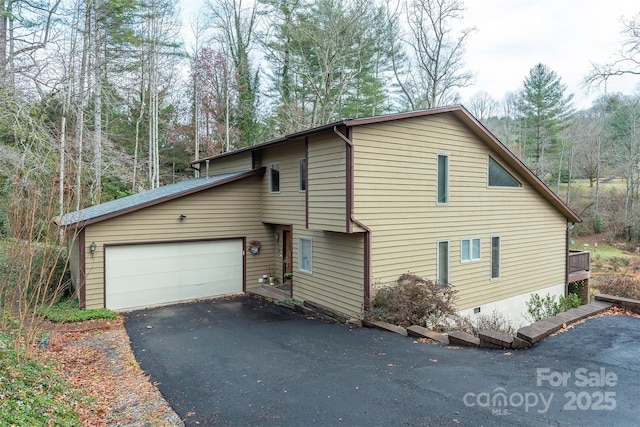 view of home's exterior featuring a garage