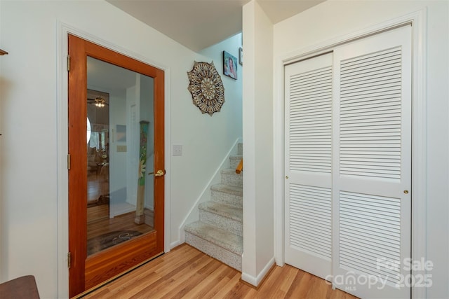 corridor featuring light hardwood / wood-style flooring