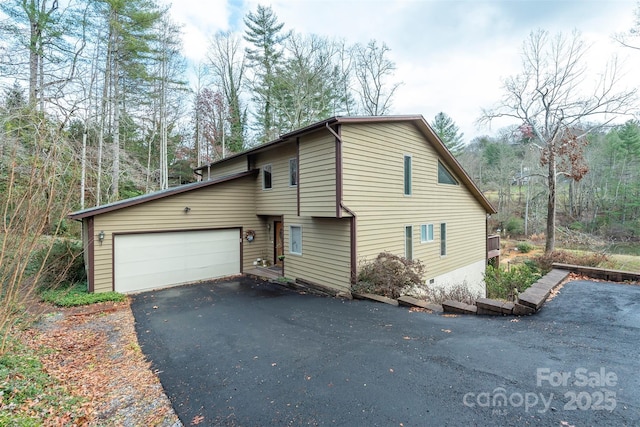 front facade with a garage