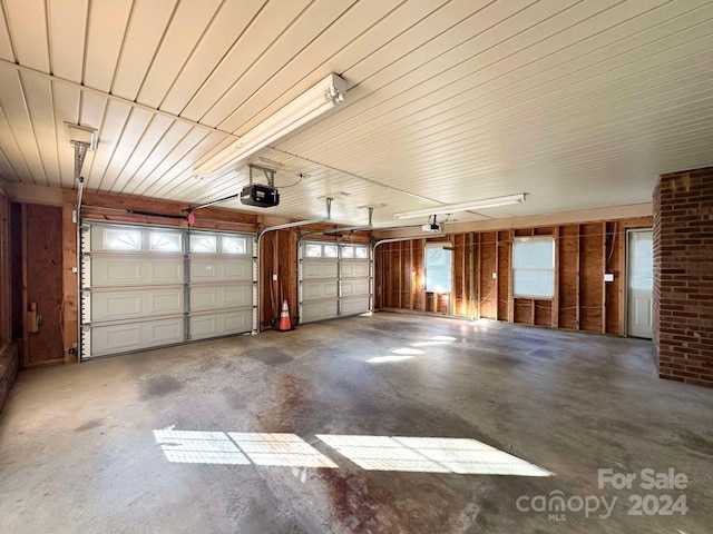 garage featuring a garage door opener