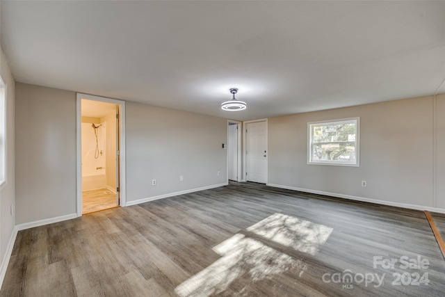 unfurnished room featuring light hardwood / wood-style floors