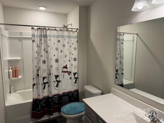 full bathroom featuring vanity, toilet, and shower / tub combo