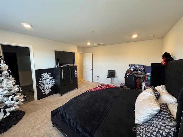 bedroom with light colored carpet