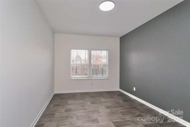 spare room featuring hardwood / wood-style flooring