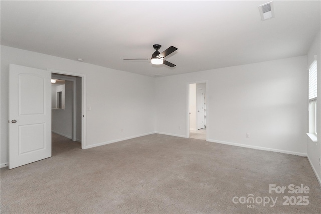 carpeted empty room with ceiling fan