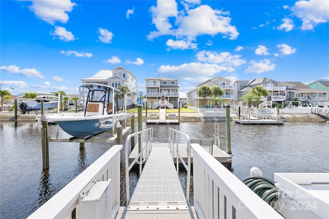 dock area with a water view