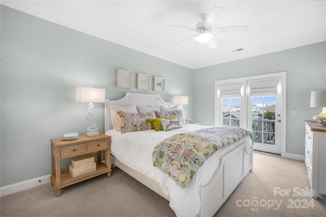 bedroom with ceiling fan, access to exterior, ornamental molding, and light carpet