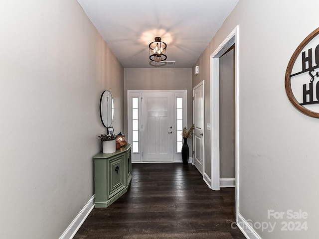 foyer with dark wood-type flooring