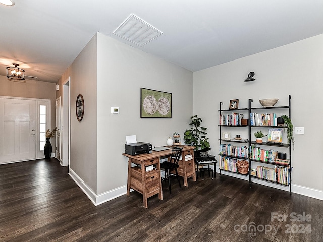 office with dark hardwood / wood-style flooring