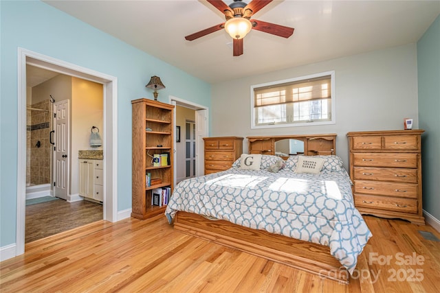 bedroom featuring a ceiling fan, baseboards, and light wood finished floors