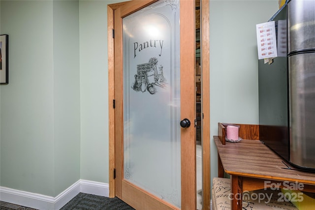 bathroom with baseboards