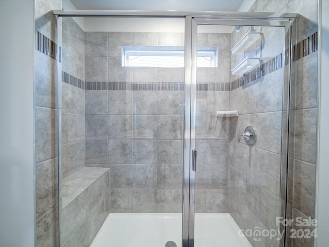 bathroom with an enclosed shower