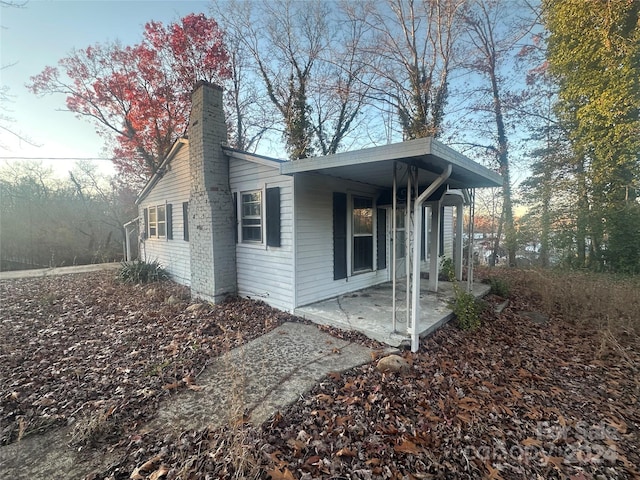 view of home's exterior with a patio area