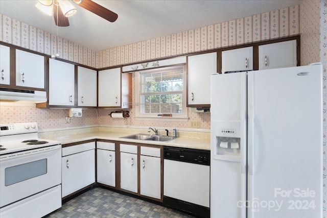 kitchen with white appliances, extractor fan, ceiling fan, sink, and white cabinetry