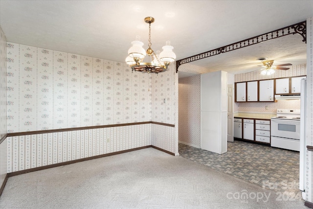 interior space with a textured ceiling and ceiling fan with notable chandelier