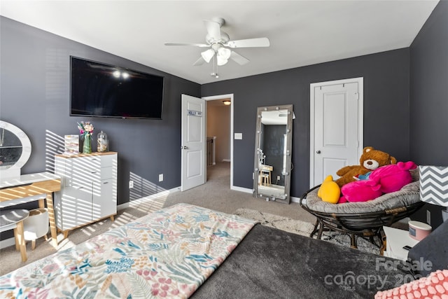 carpeted bedroom with ceiling fan