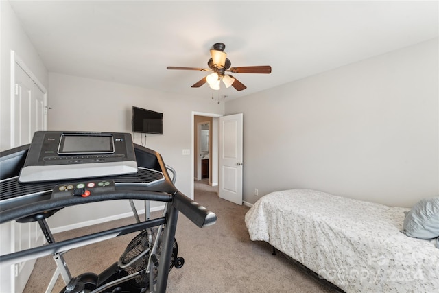 bedroom featuring ceiling fan and light carpet