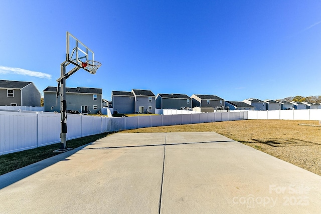 view of patio / terrace featuring basketball hoop