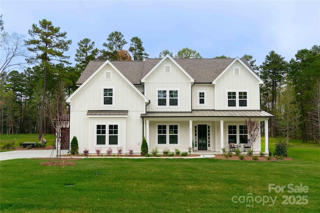 1875 Rock Hill Church Rd Unit 4, Matthews, NC 28104 - modern inspired farmhouse with a standing seam roof, a porch, and a front yard