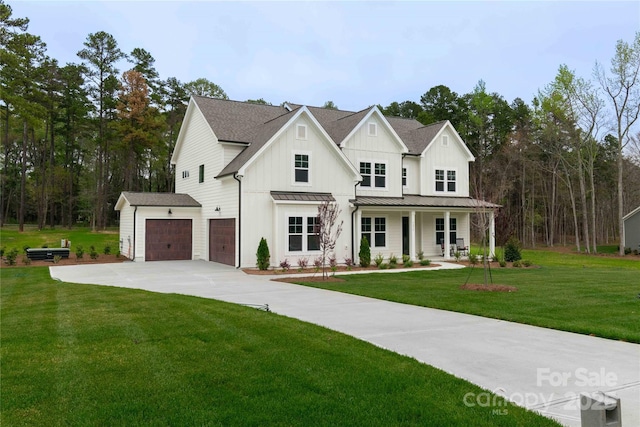 1875 Rock Hill Church Rd Unit 4, Matthews, NC 28104 - modern inspired farmhouse with a front yard, a porch, driveway, a standing seam roof, and board and batten siding