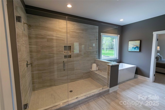 1875 Rock Hill Church Rd Unit 4, Matthews, NC 28104 - full bath with a shower stall, a freestanding bath, and recessed lighting