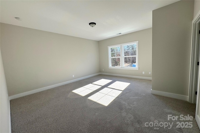 1875 Rock Hill Church Rd Unit 4, Matthews, NC 28104 - carpeted spare room with baseboards and a smoke detector