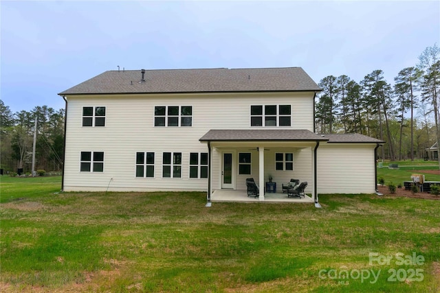 1875 Rock Hill Church Rd Unit 4, Matthews, NC 28104 - rear view of property featuring a patio area, a lawn, and roof with shingles