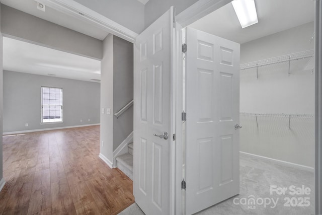 hallway featuring light hardwood / wood-style floors