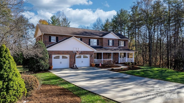 view of front of property with covered porch and a front yard