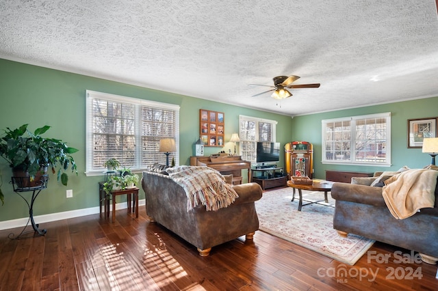 living room with a textured ceiling, ceiling fan, and dark hardwood / wood-style floors