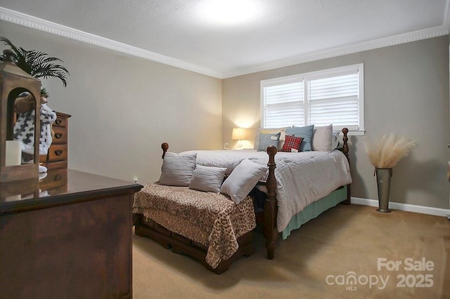 bedroom featuring ornamental molding, carpet flooring, and baseboards