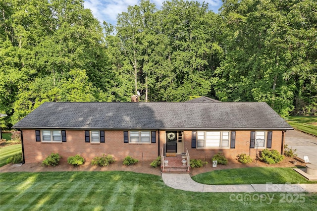 216 Delview Dr, Cherryville, NC 28021 - single story home featuring brick siding, a shingled roof, and a front yard