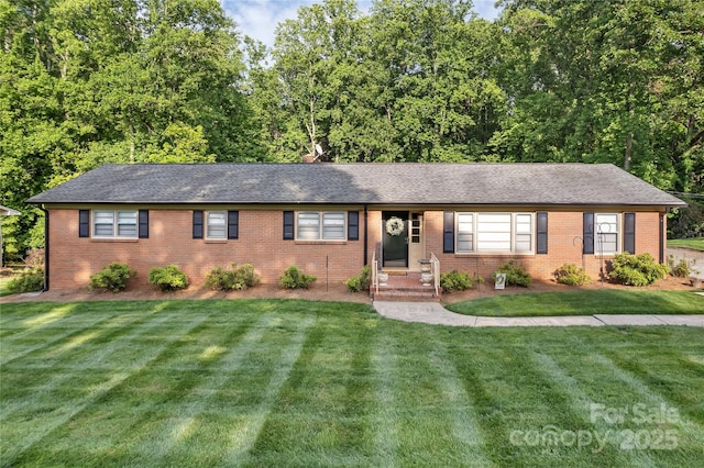 216 Delview Dr, Cherryville, NC 28021 - ranch-style house featuring brick siding, a front yard, and a shingled roof