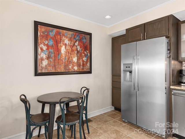 tiled dining area with ornamental molding