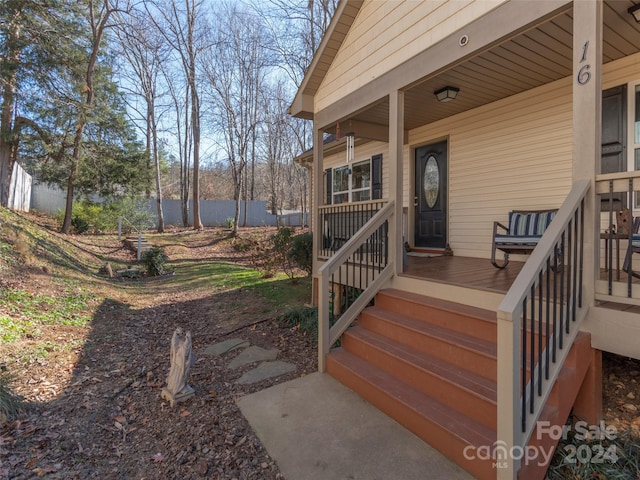 entrance to property with covered porch