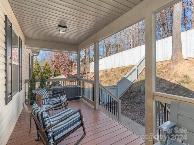 wooden terrace with covered porch