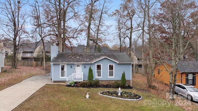 view of front of house with a front lawn