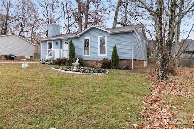 view of front of property with a front lawn