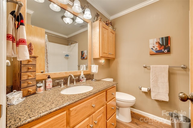 bathroom with curtained shower, wood-type flooring, toilet, vanity, and ornamental molding