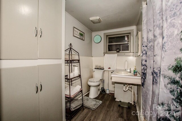 241 4th Ave N, Taylorsville, NC 28681 - bathroom featuring toilet and wood finished floors