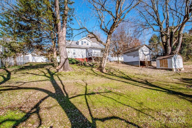 241 4th Ave N, Taylorsville, NC 28681 - view of yard with a storage shed