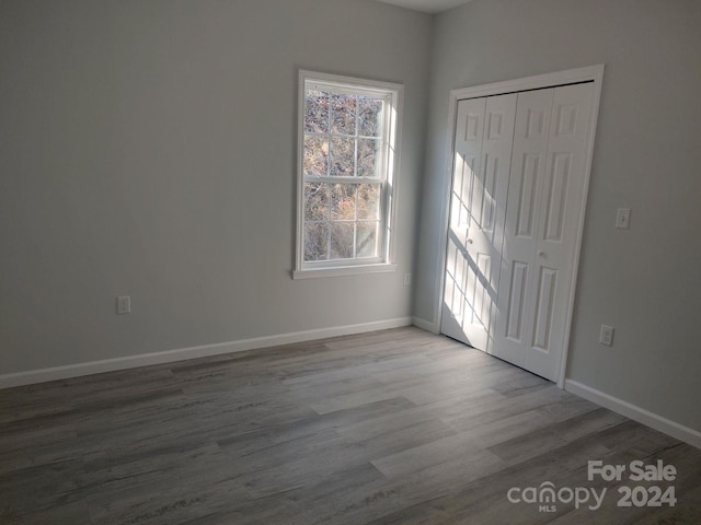 spare room featuring light hardwood / wood-style floors