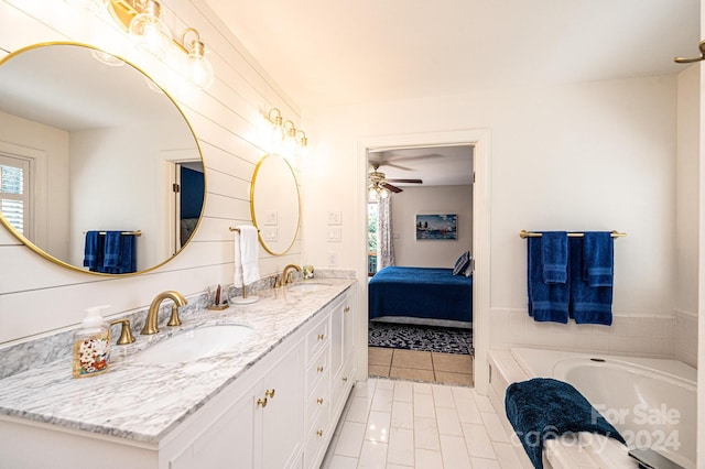 bathroom with tile patterned floors, ceiling fan, and vanity