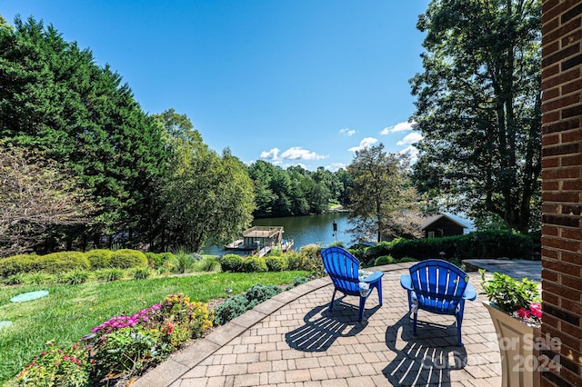 view of patio featuring a water view